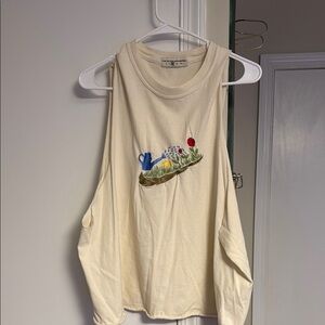 Cream Sleeveless Top with Embroidered Design